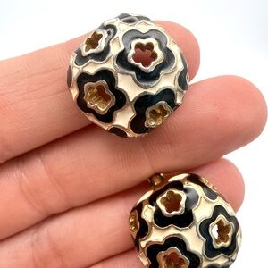 St.John floral cut out, clip earrings, black cream enamel, gold tone